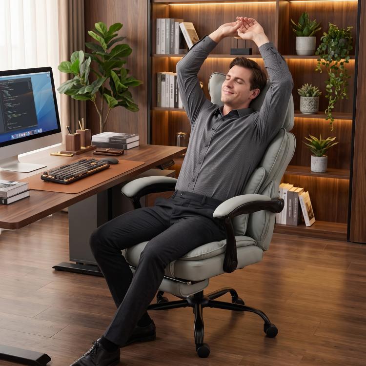 Gray office chair with headrest and footrest