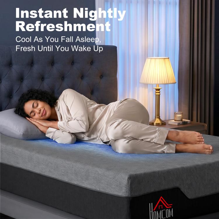 Grey queen memory foam mattress with sleeper model lying on the surface