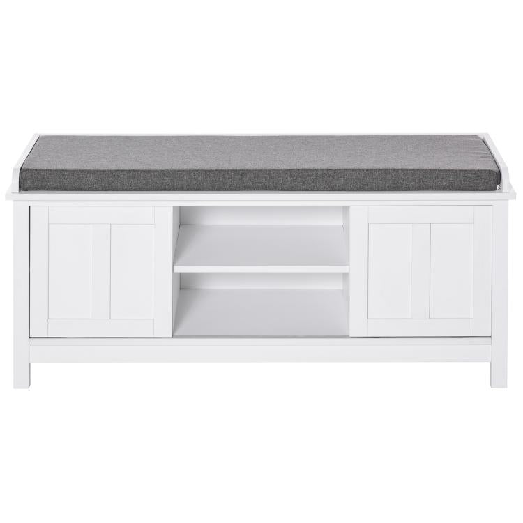 White shoe storage bench with gray upholstered cushion and open storage shelves