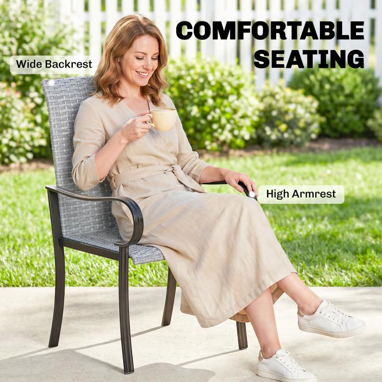 Gray outdoor wicker dining chair with high armrests and wide backrest