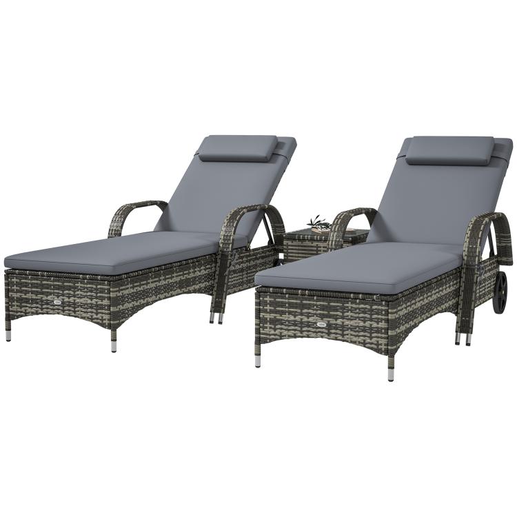 Two gray outdoor chaise lounge chairs with dark wicker weave and padded headrests