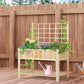 Wooden raised garden bed with trellis, flower boxes, and watering can on patio