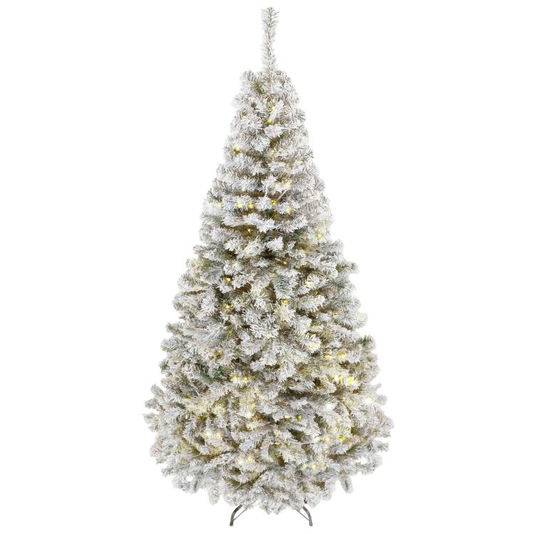 Snow-flocked prelit Christmas tree, full conical form with warm LED bulbs on branches.