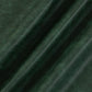 Green PU leather upholstery close-up with fine grain texture