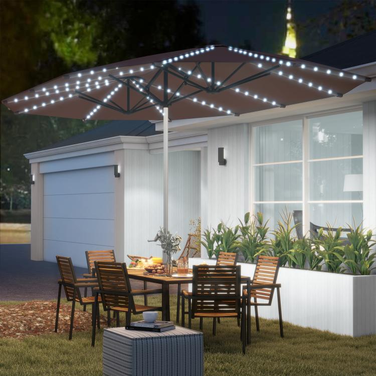 Tan patio umbrella with built-in white LED lights under the canopy