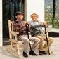 Natural wood two-person rocking loveseat with slatted backrest and armrests