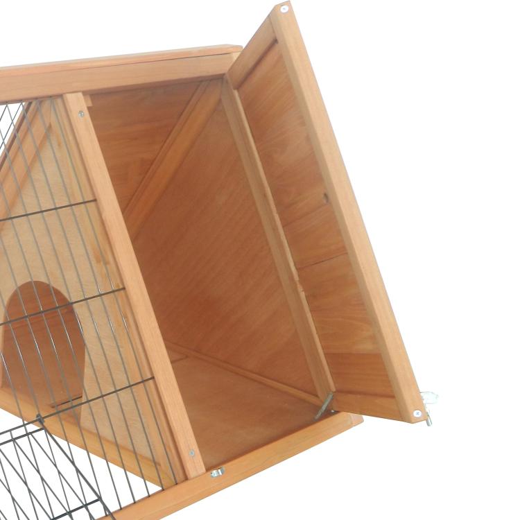 Close-up of brown wooden hinged door for wire mesh rabbit hutch
