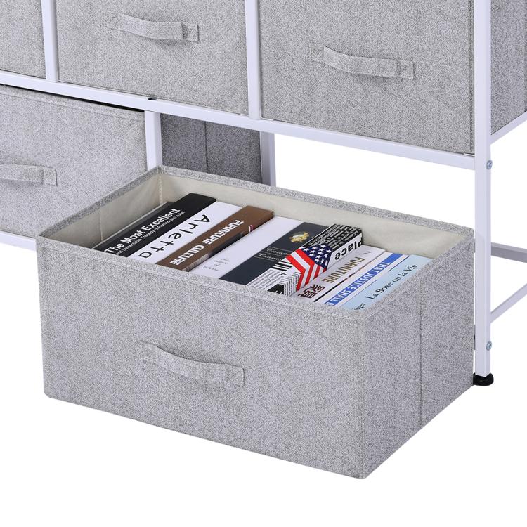 Light gray fabric storage cube dresser with five drawers, one open bin showing papers