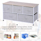 Light gray fabric drawer dresser with wood top, 5 storage bins, white frame.