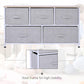 Steel-frame support for light gray fabric drawer dresser with wood top, white frame.