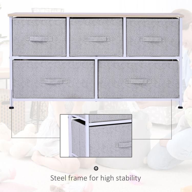 Steel-frame support for light gray fabric drawer dresser with wood top, white frame.