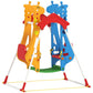 Kids indoor swing set with double seats, red roof, blue and orange towers, white A-frame