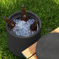 Charcoal gray outdoor side table with ice bucket, lid, and partial wood tabletop
