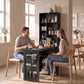 Black foldable writing table with open storage shelves and hanging storage bins