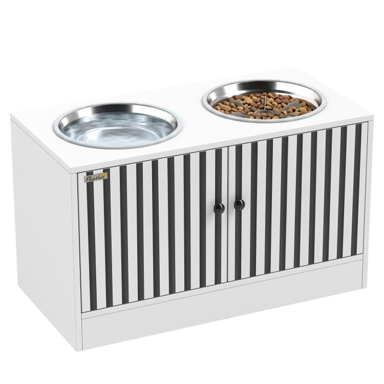 White elevated dog feeding station with two stainless steel bowls and black slat front