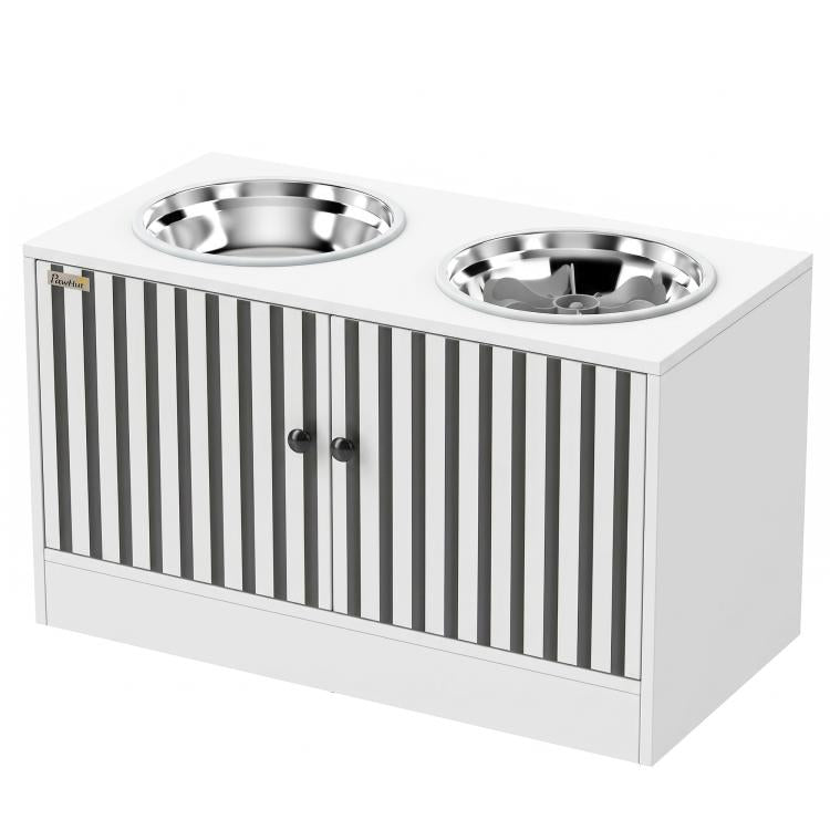 White elevated dog feeding station with two stainless steel bowls and storage cabinet front