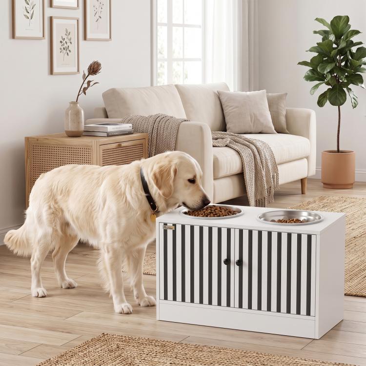 White dog feeding station with cabinet and two stainless bowls, striped front, slow-feeder style