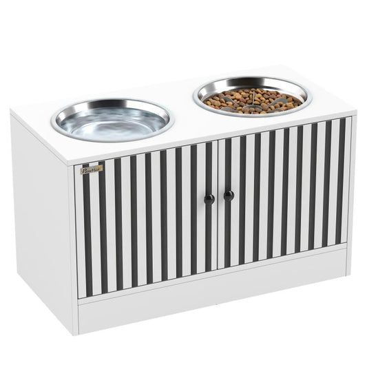 White elevated dog feeding station with two stainless steel bowls and black slat front