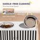 Stainless steel dog bowls in a white feeding station with wipe-clean design