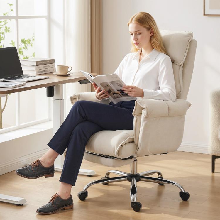Cream white reclining office chair with headrest, padded armrests, caster base, footrest