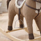 Brown fabric rocking horse toy with side harness and wooden base, close-up