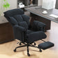 Black reclining office chair with footrest extended and cushioned headrest