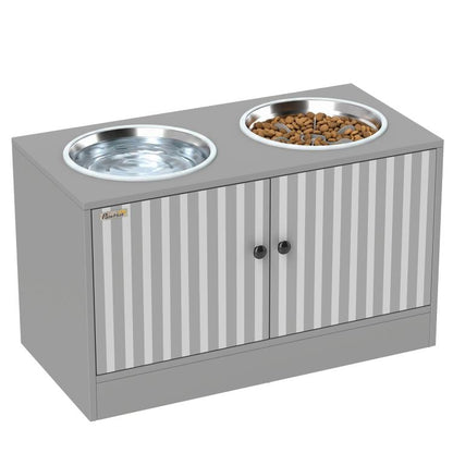 Gray dog feeding cabinet with two raised stainless steel bowls and striped front doors