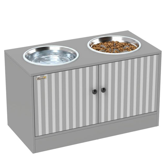 Gray dog feeding cabinet with two raised stainless steel bowls and striped front doors