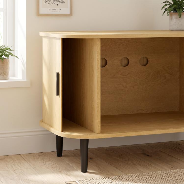 Wood cat litter box enclosure with sliding door, open side view, dark legs