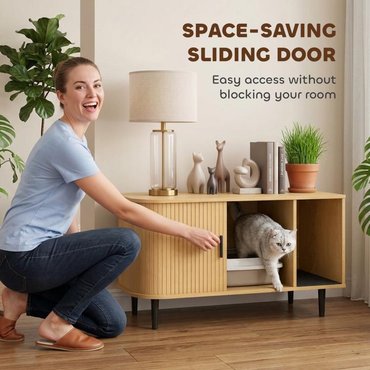 Wood cat litter box enclosure with sliding door, gray cat at the open compartment