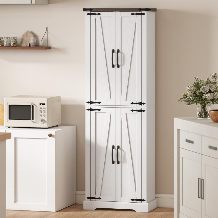 White freestanding pantry cabinet with paneled doors and metal bar handles