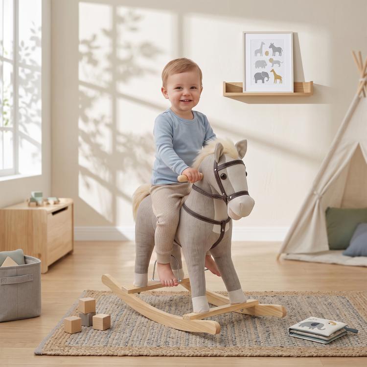 Gray rocking horse ride-on toy with dark brown harness straps and wooden base