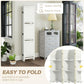 White tall folding privacy screen with shelf compartments beside a lamp and cabinet.