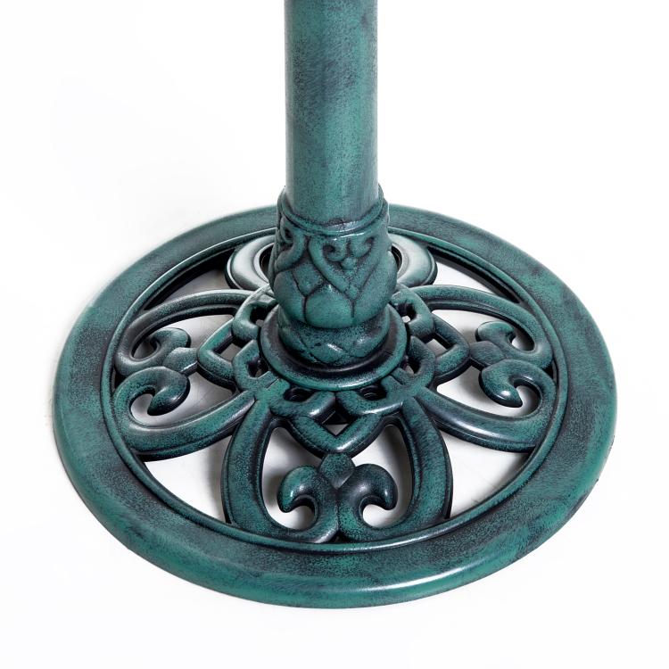 Teal resin bird bath base with fleur-de-lis scrollwork and pedestal