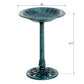 Teal-green resin bird bath with fluted round bowl and ornate pedestal base