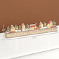 Wood-effect Christmas advent calendar with house village and 24 drawer countdown row
