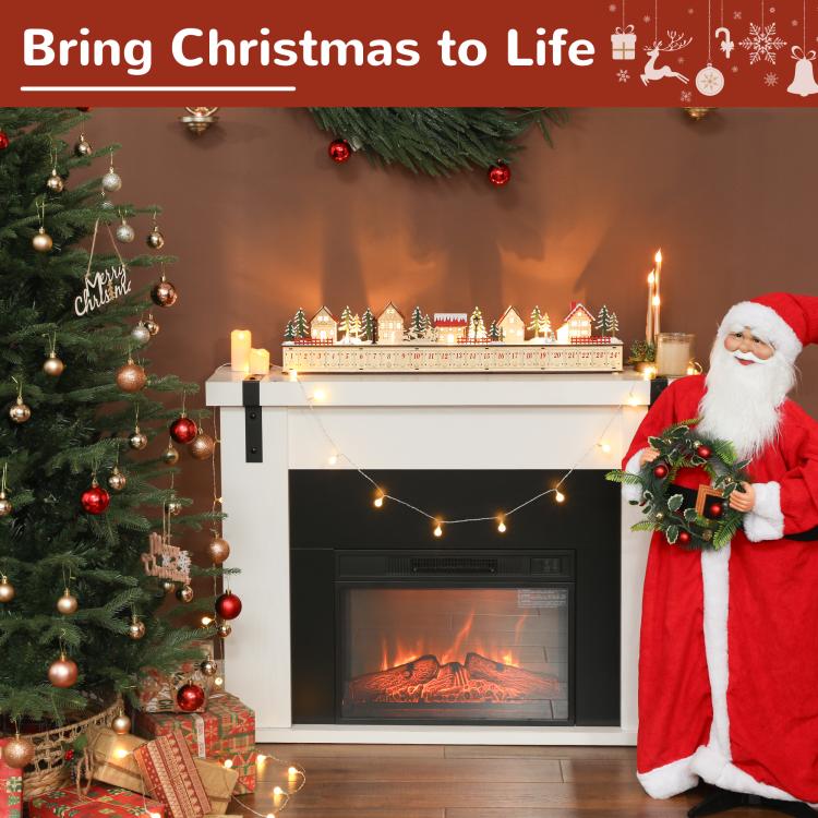 Christmas advent calendar on mantel with glowing lights and Santa figure beside it