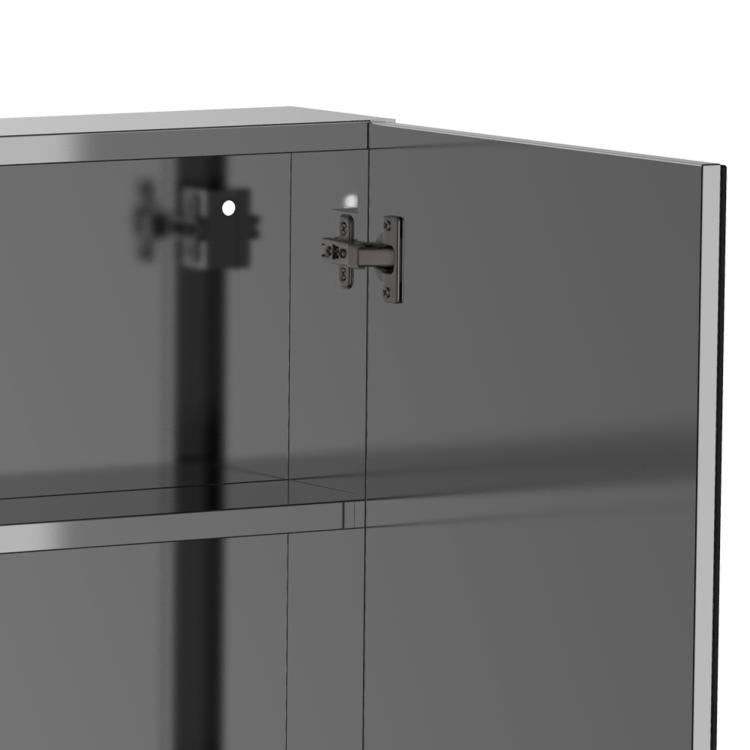 Close-up of mirrored cabinet double doors with stainless frame hinges and handles.