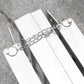 Portable wheelchair ramp with chain latch, hinged folding panels, white ramp surface