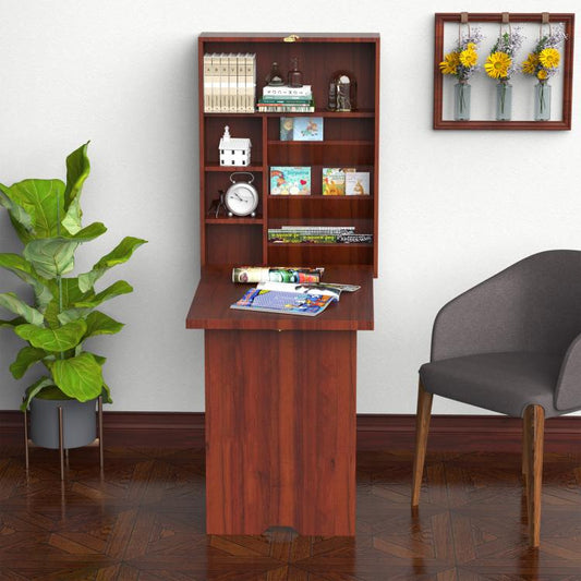 Wall-mounted mahogany desk with cubby shelves, paper on tabletop, laptop and decor
