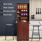 Mahogany wall desk with food-storage shelves, fold-out counter, kitchen utensils nearby