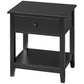 Black side table with drawer and lower shelf, squared top and tapered legs.