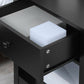 Black 2-tier side table with drawer and open shelf, top surface visible