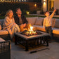 Outdoor square fire pit with fire burning inside spark-screened bowl on patio