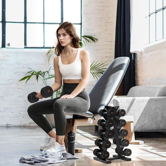 Woman seated on a reclining chair with a massage roller at her feet