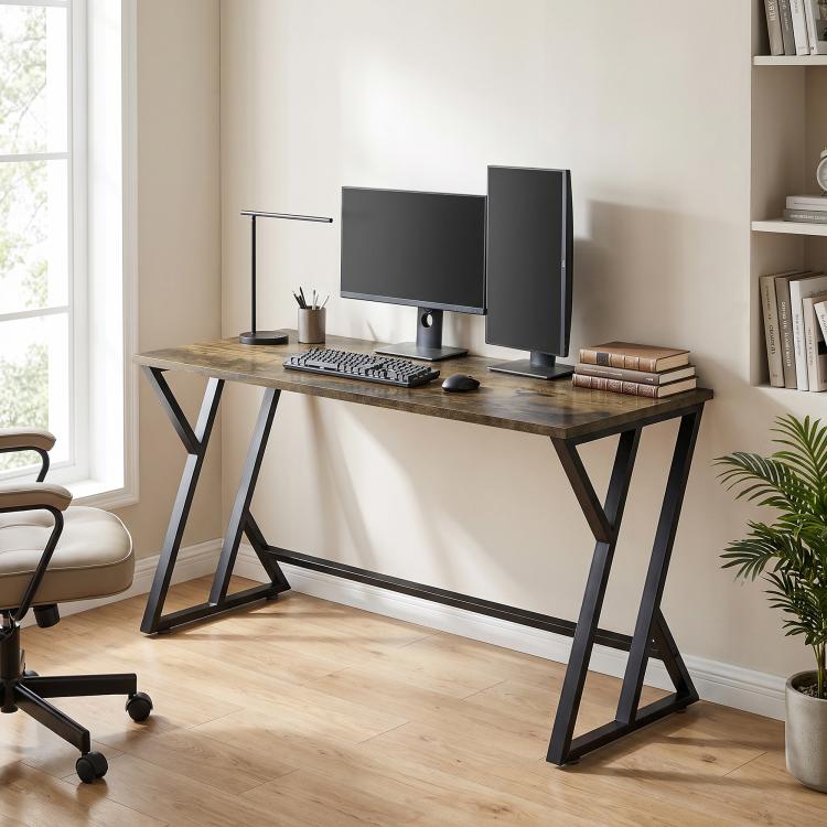 Rustic brown desk with black Z legs holding dual monitors and keyboard