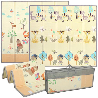 Reversible baby play mat with forest animal print, folded for storage, beige and blue