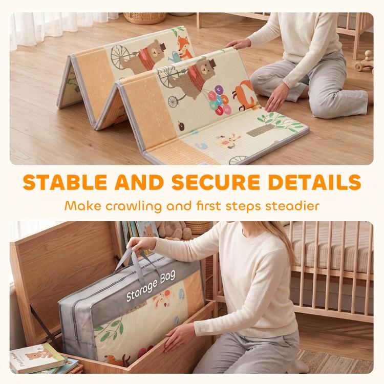 Reversible baby play mat folded up with carry handle for storage, forest animal print