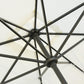 Cream patio solar umbrella canopy with dark frame and central hub, view from below