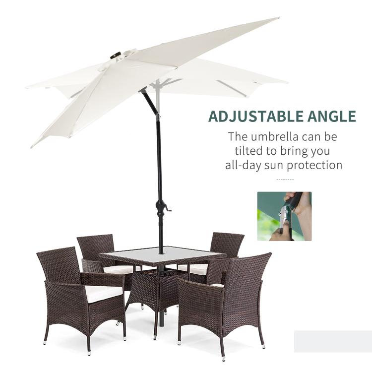 Cream white patio umbrella with adjustable tilt angle and open canopy above table.